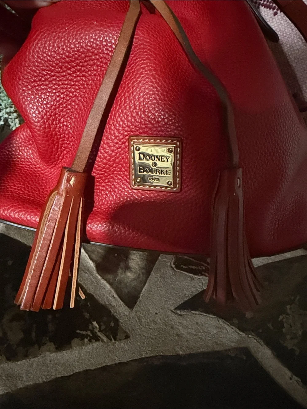 Dooney & Bourke Red Pebbled Leather Drawstring Bucket with Brown Trim